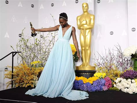 blue prada dress oscars|Lupita Nyong'o's icy blue dress at the 2024 Academy Awards .